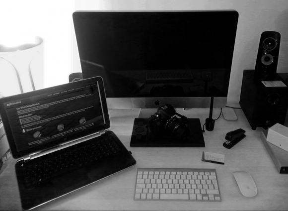 Our office consists of:<br />
27 inch iMac for graphic design and video editing, <br />
a top spec laptop for testing and web design, a Canon EOS SLR Digital Camera, a Wacom Intuous 4 Design Tablet <br />
<br />
...oh, and a printer and a stapler for the boring stuff!